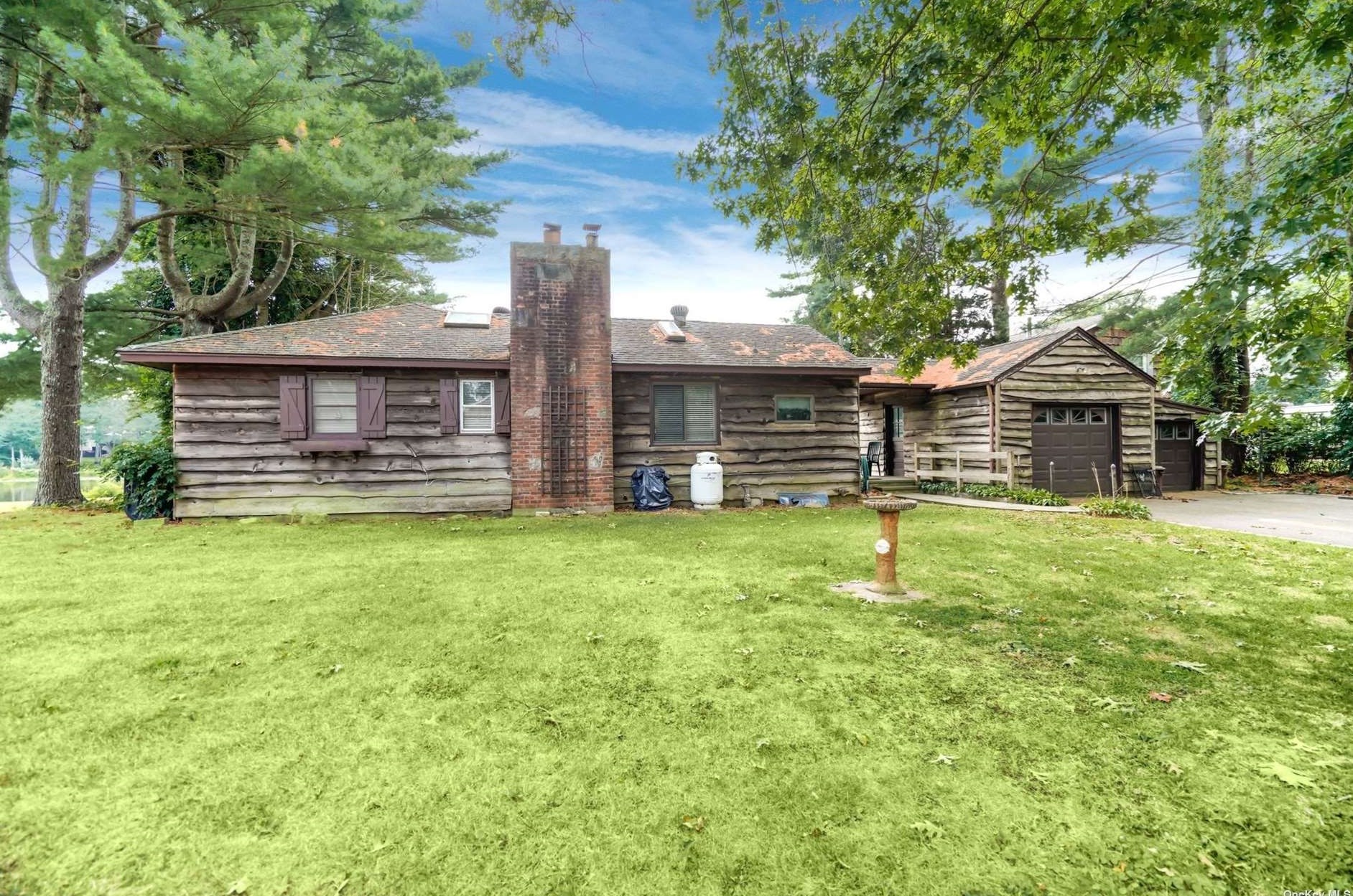 4 Lake Dr, Middle Island, NY 11953-2363