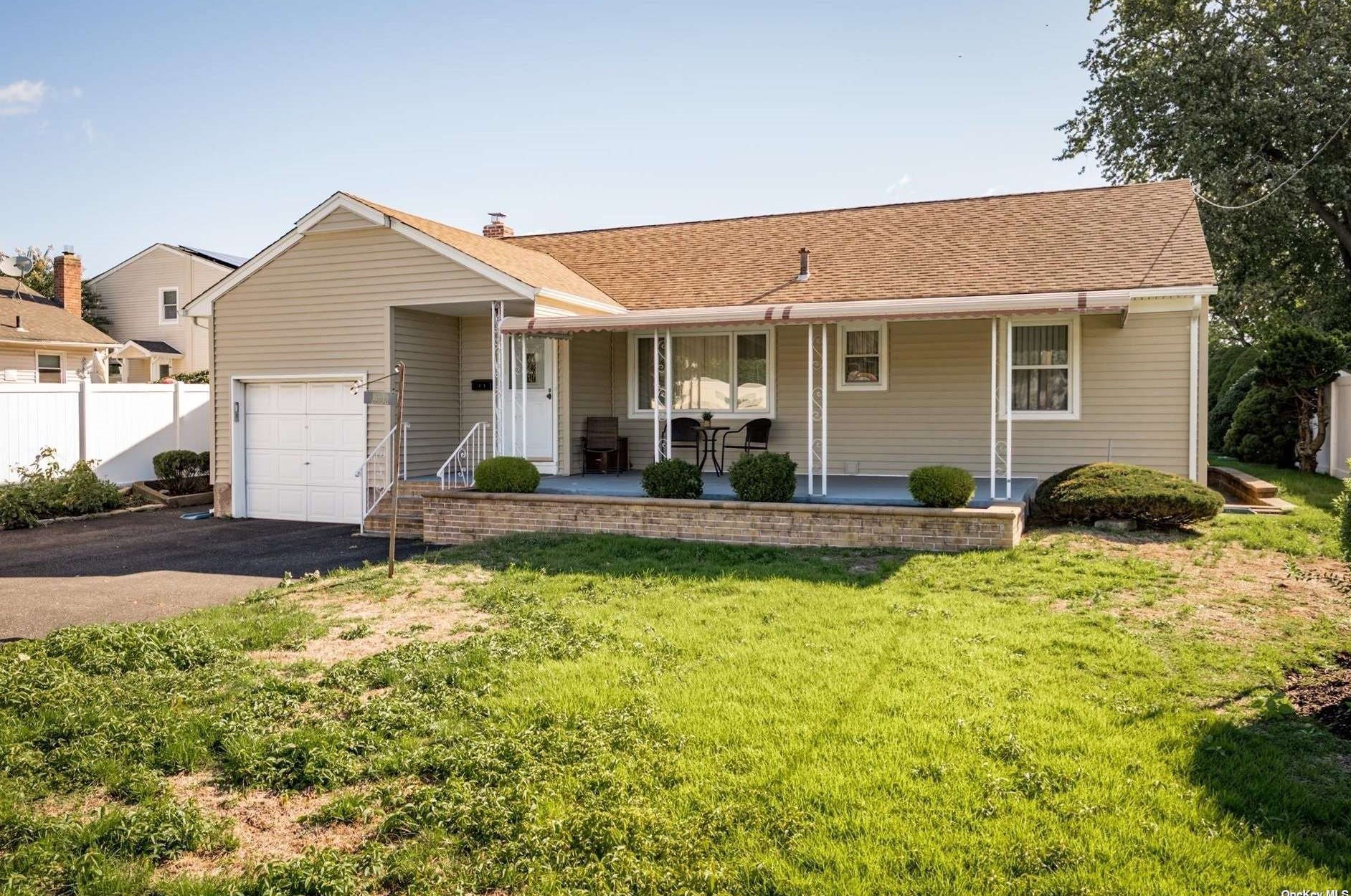 1034 Hicksville Rd, East Massapequa, NY 11758-1213