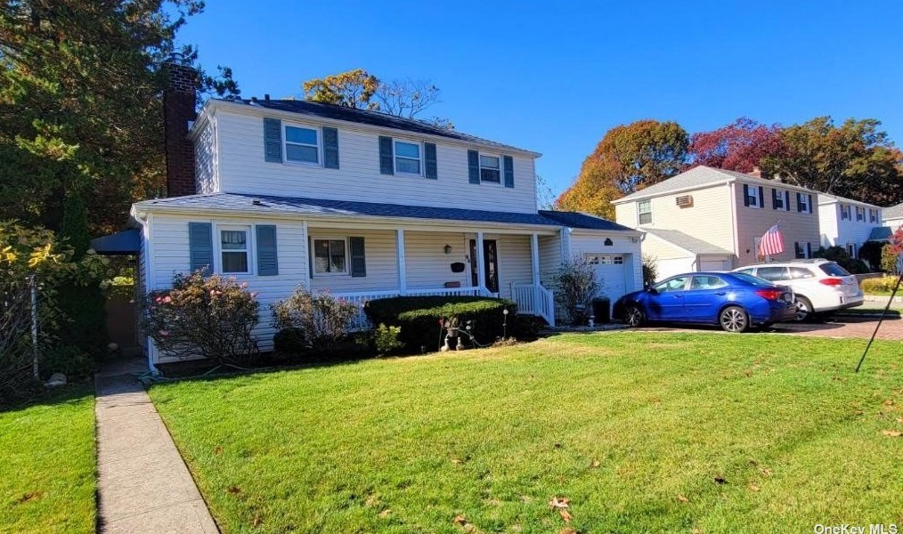 64 Roydon Dr, North Merrick, NY 11566-1423