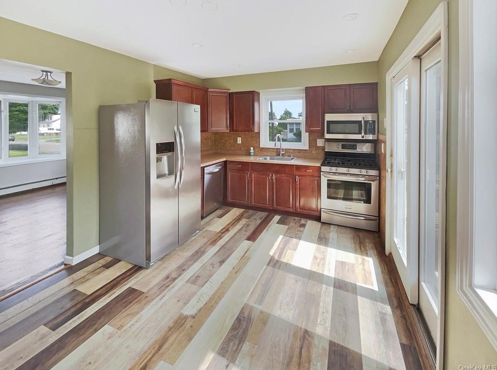 693 Adams Ave, North Lindenhurst, NY 11757