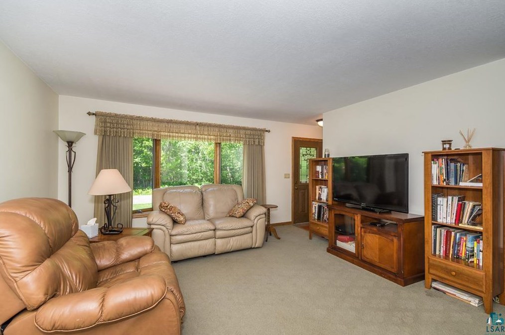608 26th St, Scanlon, MN 55720