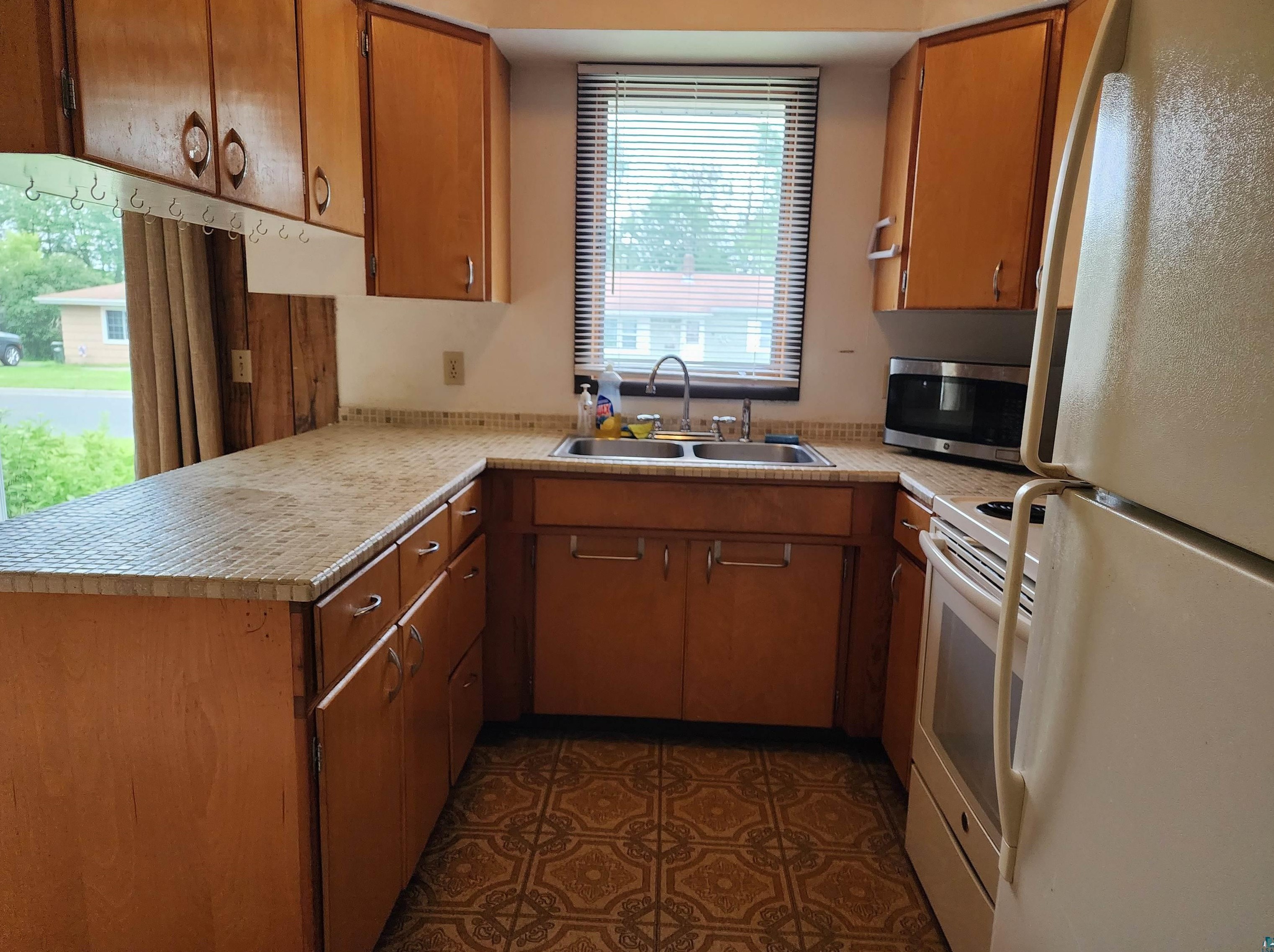 607 24th St, Scanlon, MN 55720