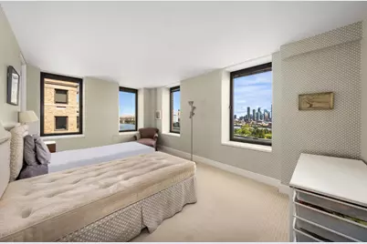 450 E 52nd Street #11THFLDUPL, New York City, NY 10022 - Photo 32