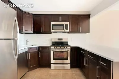 71-03 Cooper Avenue #3FAM, New York City, NY 11385 - Photo 1