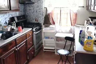 98-02 103rd Ave, Ozone Park, NY 11417 - Photo 1