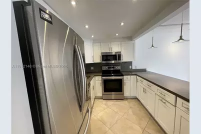 1650 NE 115th #311, Miami, FL 33181 - Photo 2