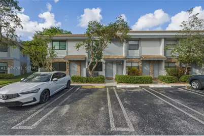 9853 Riverside #8-24, Coral Springs, FL 33071 - Photo 1