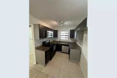 11213 Royal Palm #11213, Coral Springs, FL 33065 - Photo 2
