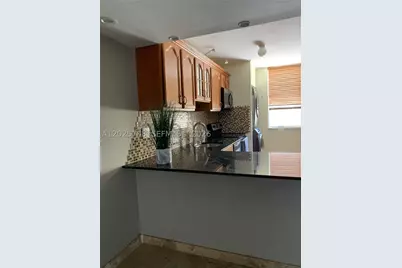 1651 NE 115th #21C, Miami, FL 33181 - Photo 12