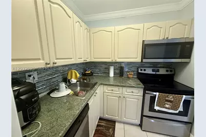 10413 N Kendall #B208, Miami, FL 33176 - Photo 6