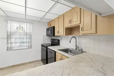 7887 Golf Cir #203, Margate, FL 33063 - Photo 18