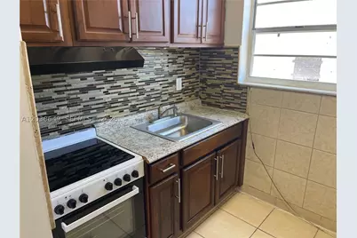 1043 NW 2nd #14, Miami, FL 33128 - Photo 1