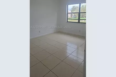 9022 NW 28th #2-202, Coral Springs, FL 33065 - Photo 1
