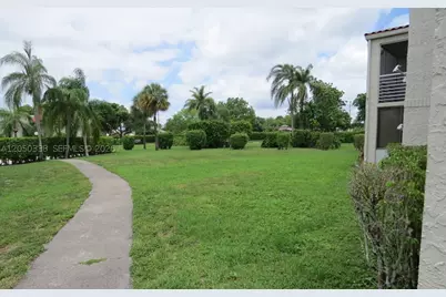7435 Woodmont #101, Tamarac, FL 33321 - Photo 1