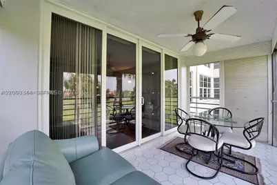 3970 Oaks Clubhouse #302, Pompano Beach, FL 33069 - Photo 10