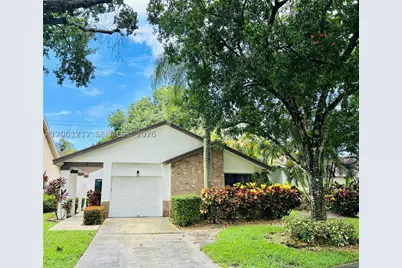 2560 Calamondin, Coconut Creek, FL 33063 - Photo 2