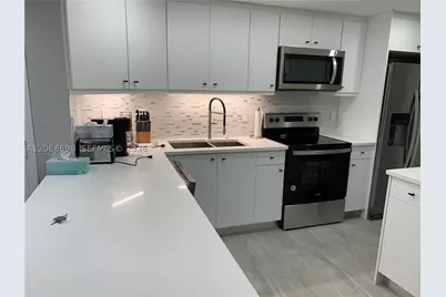 100 Golden Isles #409, Hallandale Beach, FL 33009 - Photo 16