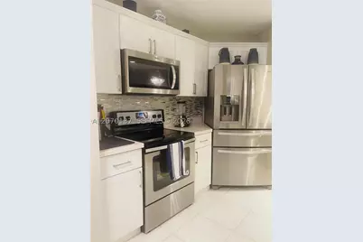 10551 W Broward #111, Plantation, FL 33324 - Photo 1