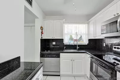 2651 Sunrise Lakes Drive E #104, Sunrise, FL 33322 - Photo 2
