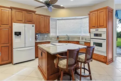 13407 NW Wax Myrtle Trail, Palm City, FL 34990 - Photo 18