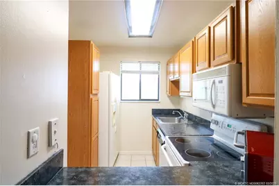 5433 SE Miles Grant Road #203, Stuart, FL 34997 - Photo 2