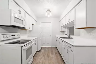 4047 NW Cinnamon Tree Circle, Jensen Beach, FL 34957 - Photo 8