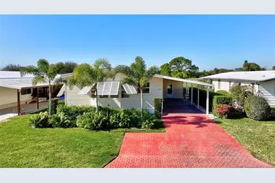 7924 SE Saratoga Drive, Hobe Sound, FL 33455 - Photo 1