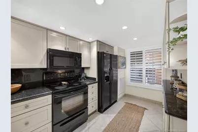 4680 NE Sandpebble Trace #103, Stuart, FL 34996 - Photo 6