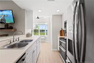 5799 NE Island Cove Way, Stuart, FL 34996 - Photo 18