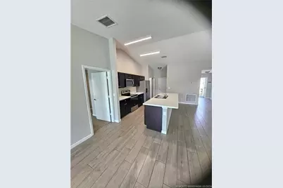 1410 SW Flounder Lane, Port Saint Lucie, FL 34953 - Photo 4