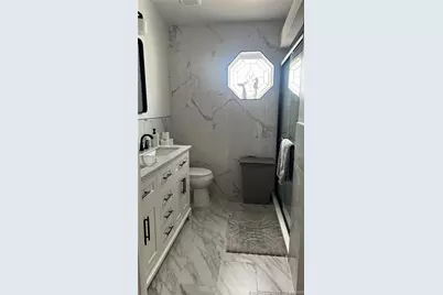 1077 Nettles Boulevard, Jensen Beach, FL 34957 - Photo 10