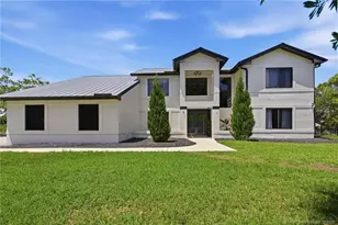 9809 SW Malibu Terrace, Palm City, FL 34990 - Photo 1