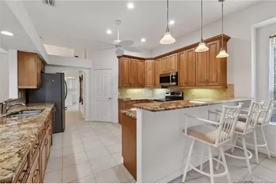 4615 NW Wandering Oak Court, Jensen Beach, FL 34957 - Photo 18