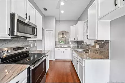 4516 NW Wandering Oak Court, Jensen Beach, FL 34957 - Photo 18