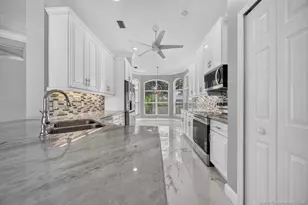 1676 SW Monarch Club Dr, Palm City, FL 34990 - Photo 20