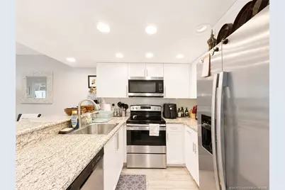 390 NE Edgewater Drive #302, Stuart, FL 34996 - Photo 10