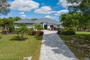 4977 SW Lake Grove Cir, Palm City, FL 34990 - Photo 1