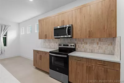7030 SE Park Trace Drive, Stuart, FL 34997 - Photo 28