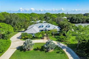 2695 NE Cypress Ln, Jensen Beach, FL 34957 - Photo 1