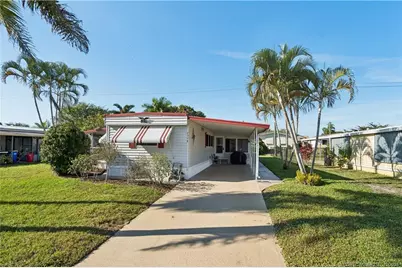 7398 SE Swan Avenue, Hobe Sound, FL 33455 - Photo 1