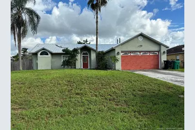 699 SW Hoffenberg Avenue, Port Saint Lucie, FL 34953 - Photo 1
