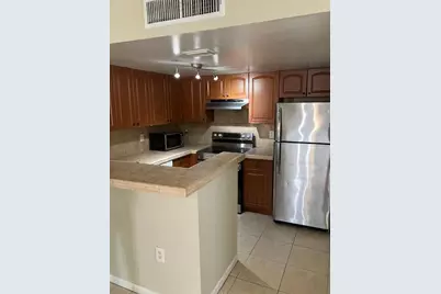 1727 Village Boulevard #111, West Palm Beach, FL 33409 - Photo 2