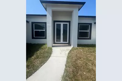 1031 SW Du Bois Avenue, Port Saint Lucie, FL 34953 - Photo 1