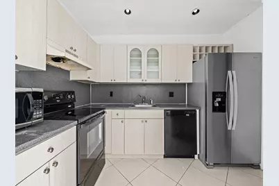 1 Jacaranda Country Club Drive #202, Plantation, FL 33324 - Photo 2