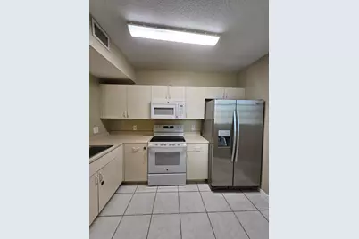 1063 Golden Lakes Boulevard #311, West Palm Beach, FL 33411 - Photo 4