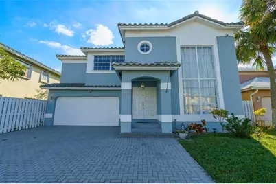 4450 NW 55th Drive, Coconut Creek, FL 33073 - Photo 1