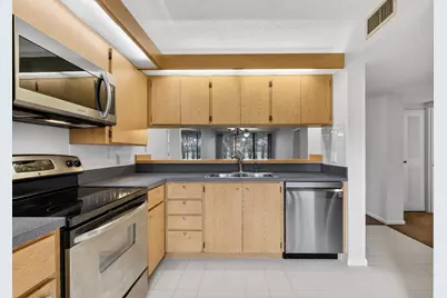 2811 Village Boulevard #106, West Palm Beach, FL 33409 - Photo 8