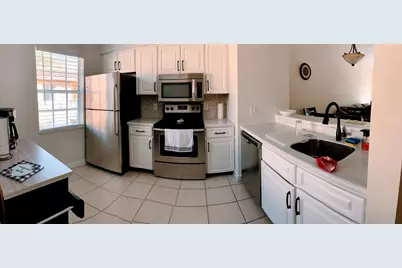 1140 Lake Shore Drive #203, Lake Park, FL 33403 - Photo 4