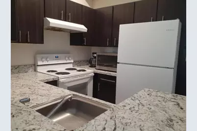 911 Lyons Road #2-207, Coconut Creek, FL 33063 - Photo 2