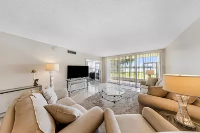 3091 N Course Drive #102, Pompano Beach, FL 33069 - Photo 1